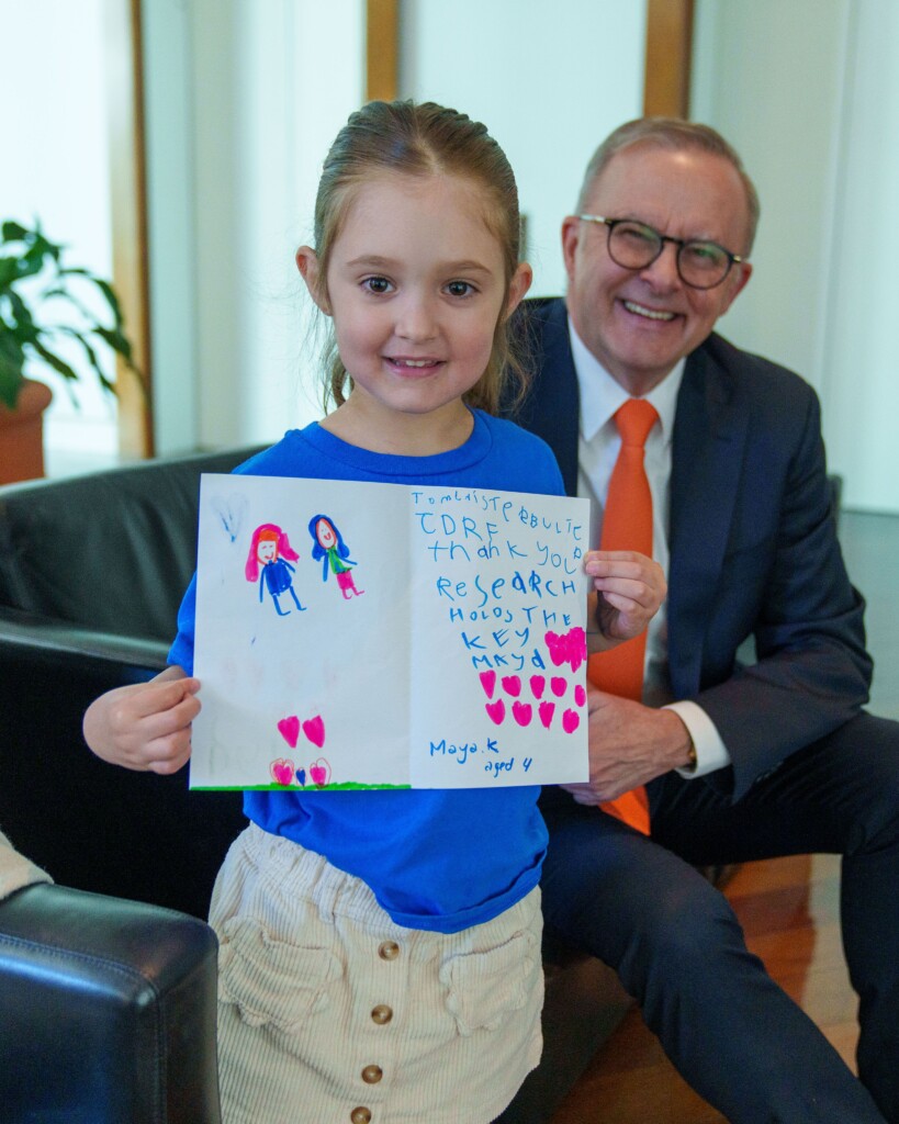 JDRF advocate, Maya, presenting a letter to Prime Minister Anthony Albanese, thanking him for his support for type 1 diabetes research.
